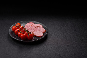 Sliced salami sausage, smoked dry meat as food background. Sliced salami