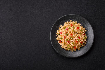 Asian food, chinese or thai rice noodles with vegetables and meat. Rice noodles