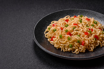 Asian food, chinese or thai rice noodles with vegetables and meat. Rice noodles