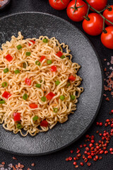 Asian food, chinese or thai rice noodles with vegetables and meat. Rice noodles