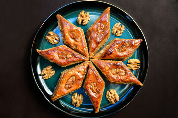 Baklava with walnuts. Homemade baklava with nuts and honey.