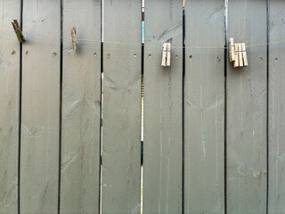 Minimal Gray Wooden Fence Texture with Clothespins