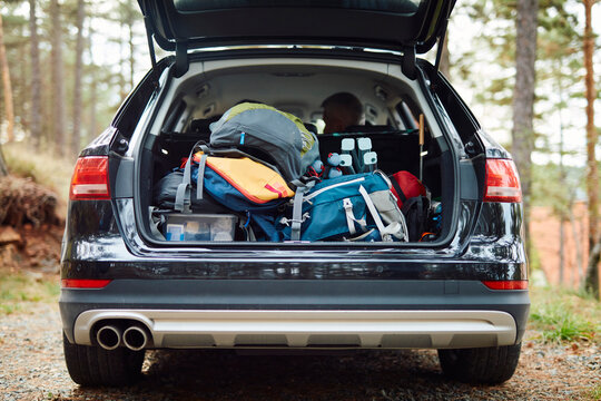 Camping gear in the trunk of a car