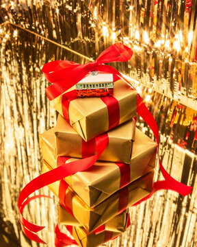 Glamorous Holiday Gifts and Reflections with Festive Background