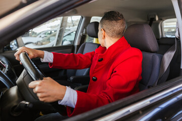 a woman maneuvering her car
