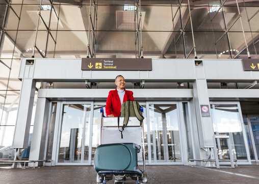 a woman leaving the airport
