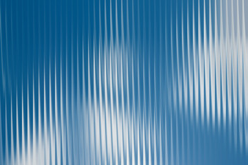 This image features an abstract background with a pattern of vertical lines in shades of blue and white.