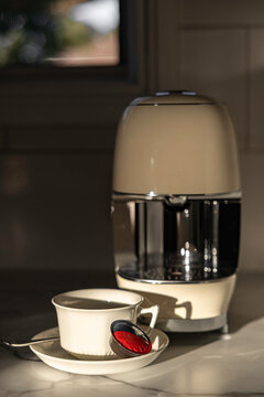 Coffee pod machine with cup and pod