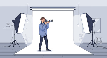 A photographer in a studio with lights and a white backdrop taking a picture
