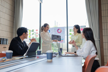Executives listening to a marketing strategy presentation.