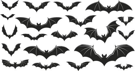Silhouetted bats in various flying positions on a white background for halloween