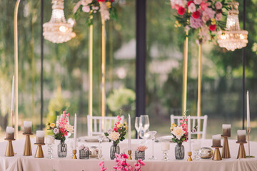 Elegant floral table setting for a spring celebration in a bright venue with natural light