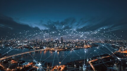 Urban skyline illuminated at night with network connections overlaid