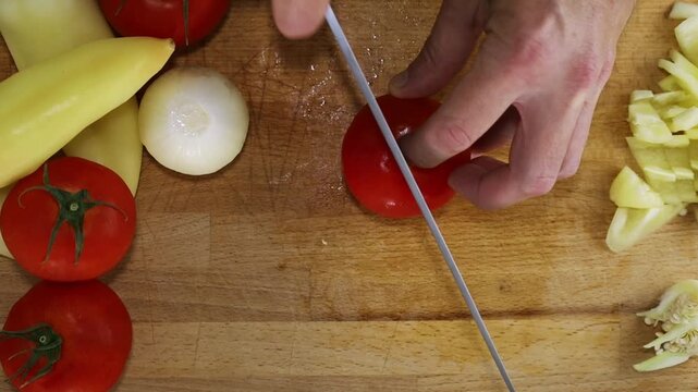 Cutting Tomato Slice Close Up