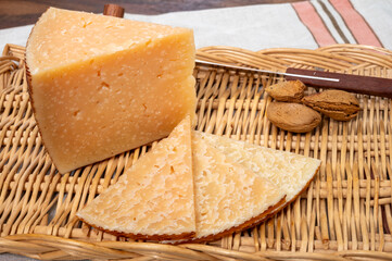 Very old anejo tostado Spanish hard cheese, cow and sheep curado, manchego, goat cheese close up