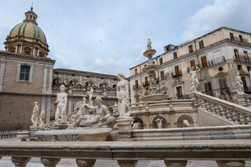 View of fontains of Palermo, citylife, ancient baroque churches, old narrow streets, Norman palaces, markets, Sicilian vacation destination, South of Italy
