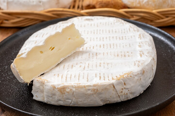 French soft cheeses collection, creamy cow's milk cheese brie with white mold, France