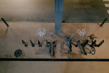 Bikes and Scooters Parked Outdoors