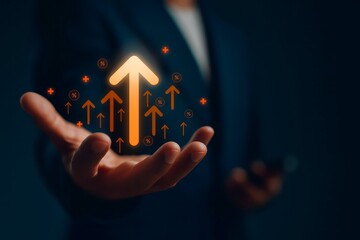 Business growth and success concept with glowing orange upward arrows in hand