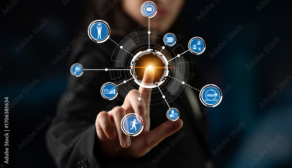 Poster a business professional engaged in a futuristic digital interface, visualizing data and technology. 