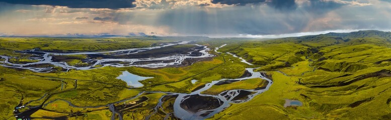 Aerial View of Iceland's Rivers and Moss Covered Terrain