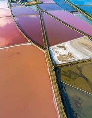 Colorful salt pans from above
