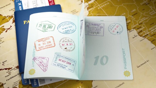 Deported red visa stamp in a open passport, Deportation and illegal immigration concept.
