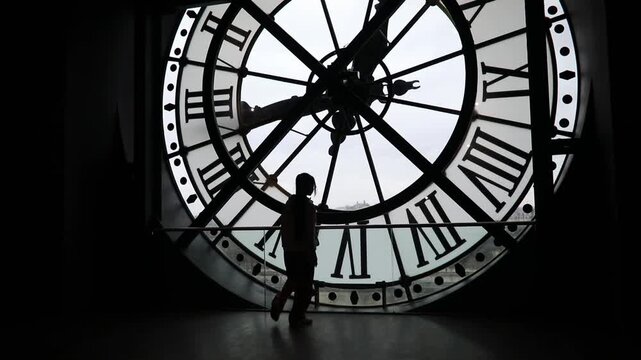 Unrecognizable people overlooking Paris.