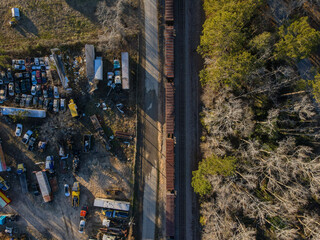 Aerial top down car graveyard winter after Hurricane Helene in Dearing McDuffie Augusta Georgia