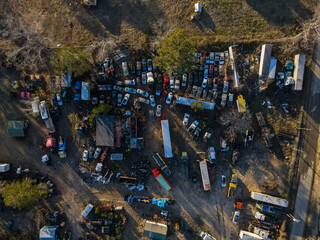 Aerial top down car graveyard winter after Hurricane Helene in Dearing McDuffie Augusta Georgia