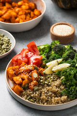 Healthy vegan buddha bowl with quinoa, pumpkin and vegetables. Vegetable recipes