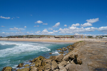 Exploring the vibrant coastline of Costa da Caparica near Lisbon in Portugal under a clear blue sky