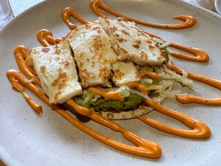 Halloumi and avocado on taco with chilli mayonnaise