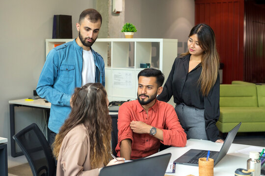Multiracial group of people working at office.