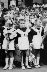 Dnepr, Ukrainian SSR, USSR - September 1, 1974: A group of first-graders in Soviet formal school...