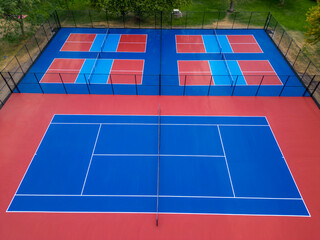 Vibrant drone aerial view of pickleball and tennis courts