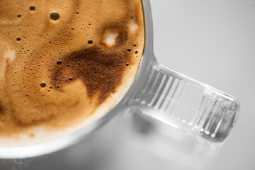 Coffee cup from above, Espresso foam texture, creamy coffee, rich, freshly brewed cup of hot latte....