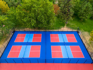 Vibrant drone aerial view of pickleball and tennis courts