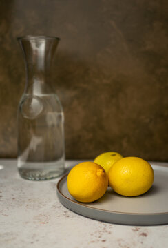 Still life with lemons and water.