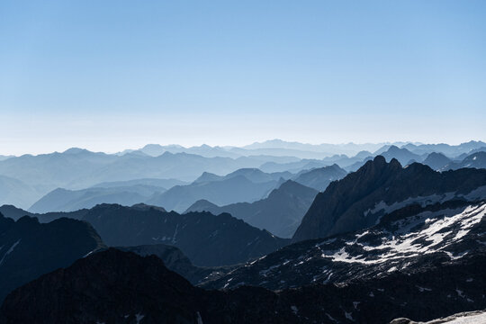Rolling peaks of the Pyrenees. From black to blue, until the sky