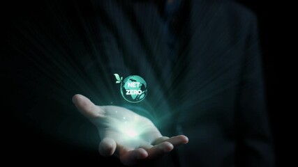 A captivating visual of a hand holding a luminous green globe with the words net zero, surrounded by eco-friendly icons, symbolizing the commitment to sustainability and climate action. Qubit