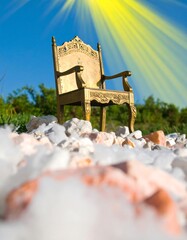 Ornate golden throne on a rocky outcrop under a radiant sky