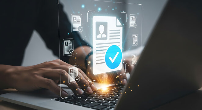 Close-up of person typing on laptop keyboard with digital approved document icons signifying file verification and recruitment process completion.