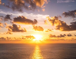 Sunset over the ocean with colorful clouds