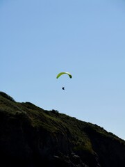 Paragliders (paragliding) near the French coast of the North Atlantic Ocean. Lower Normandy, France