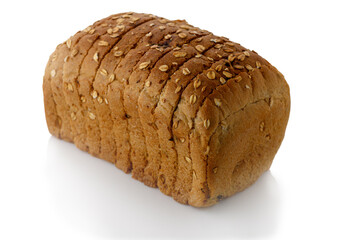 Sliced toaster bread with whole grains on white background with shadow