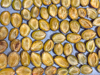 Plum halves prepared for drying