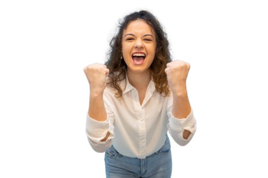 Curly-haired businesswoman celebrating success, pumping fists victoriously, wearing white shirt against transparent backdrop
