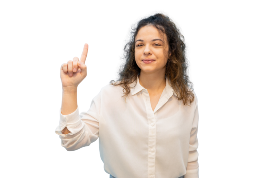 Confident professional woman gesturing upward, index finger raised, embodying workplace success and leadership potential
