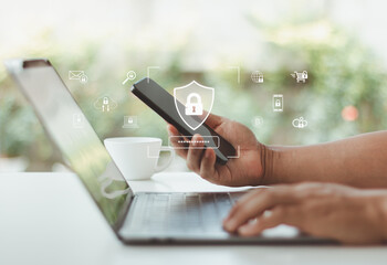 Cybersecurity concept with man using smartphone and laptop for secure login, two factor...